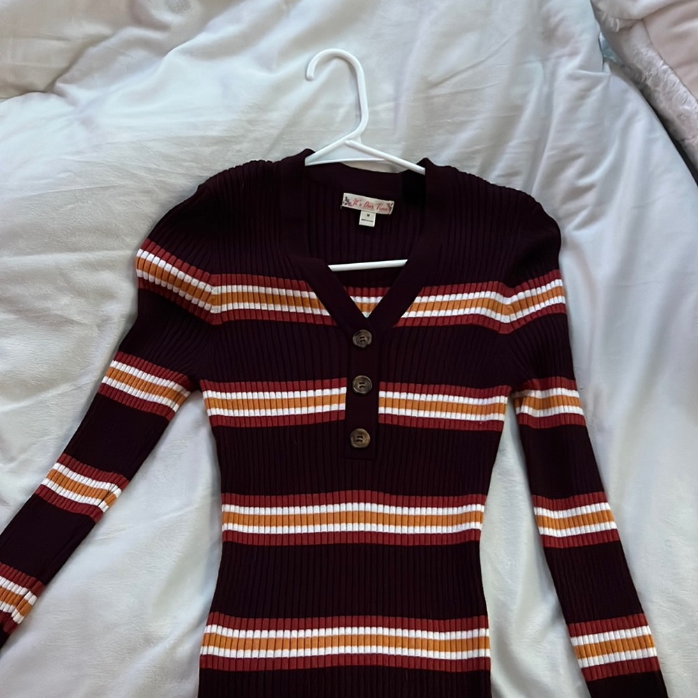 Sweater Material. Worn a couple of times. Good condition. No rips or holes.